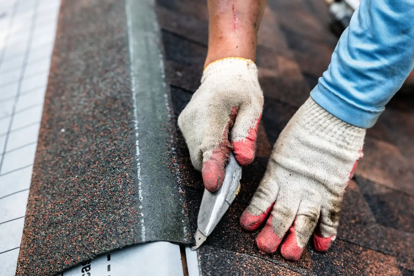 Man inspecting a roof